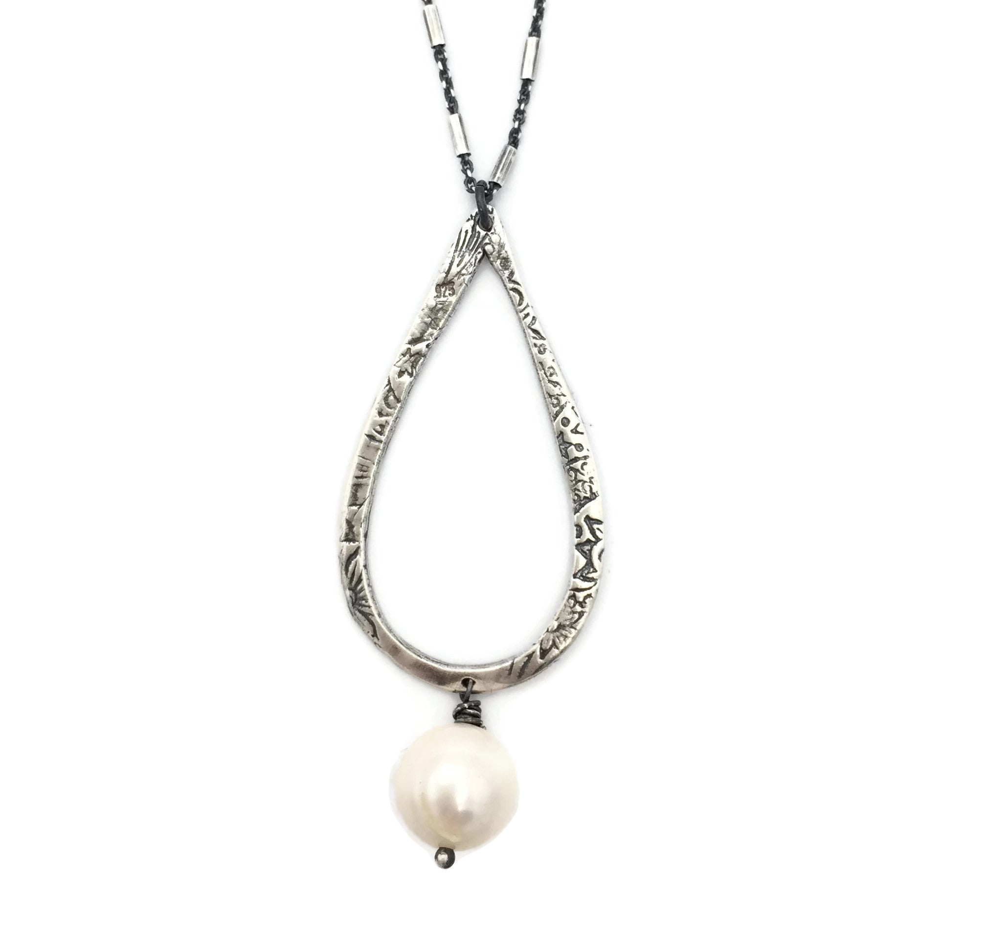 Teardrop necklace on designer chain